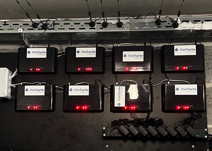 Eight FlatTurtle simboxes with 4G antennas in the Covent Garden technical room