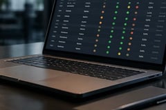 Laptop showing a building status dashboard
